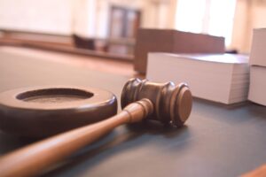 Gavel and law textbook on table in Maryland court