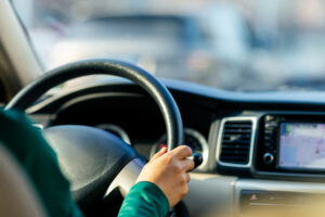 Rideshare driver for Lyft driving teen