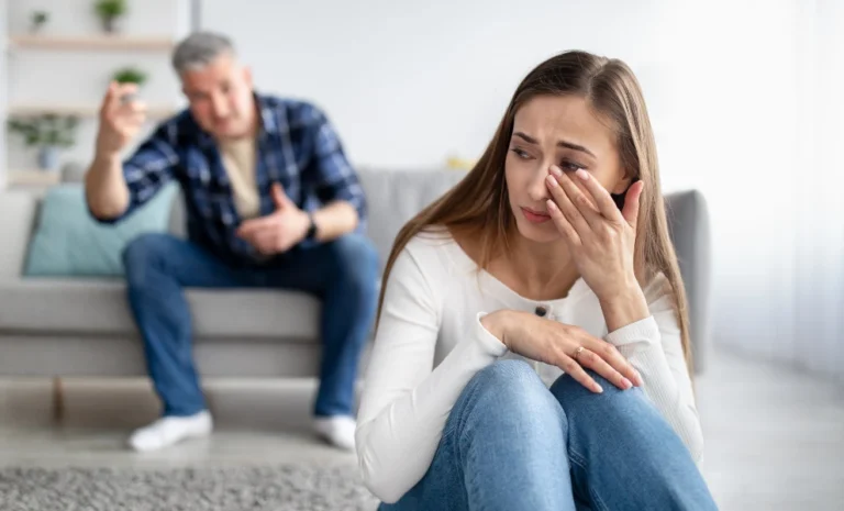 a man lamenting while a lady is sad