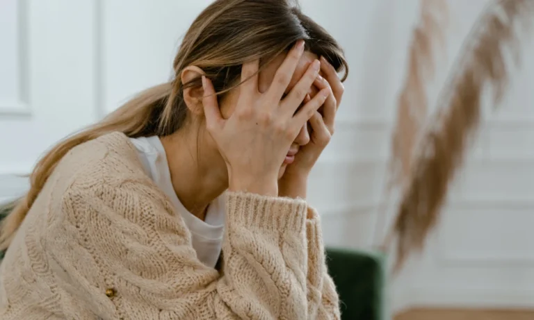 An assaulted lady in grief