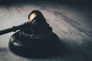Judge gavel on wooden table