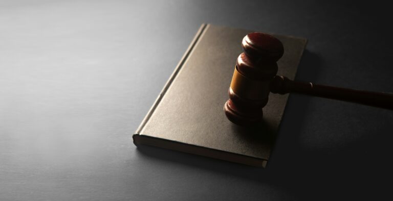 Judge gavel on black background